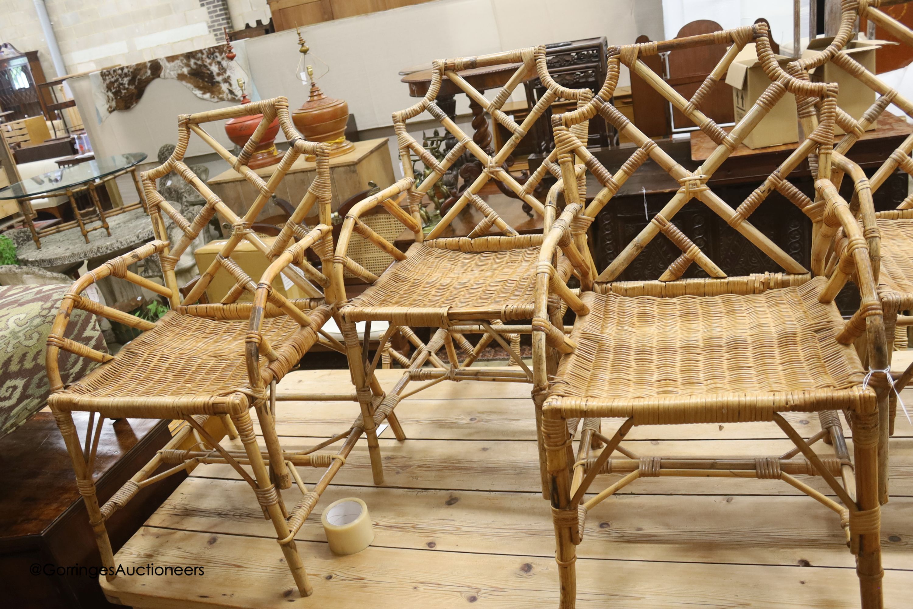 Nine caned bamboo elbow chairs